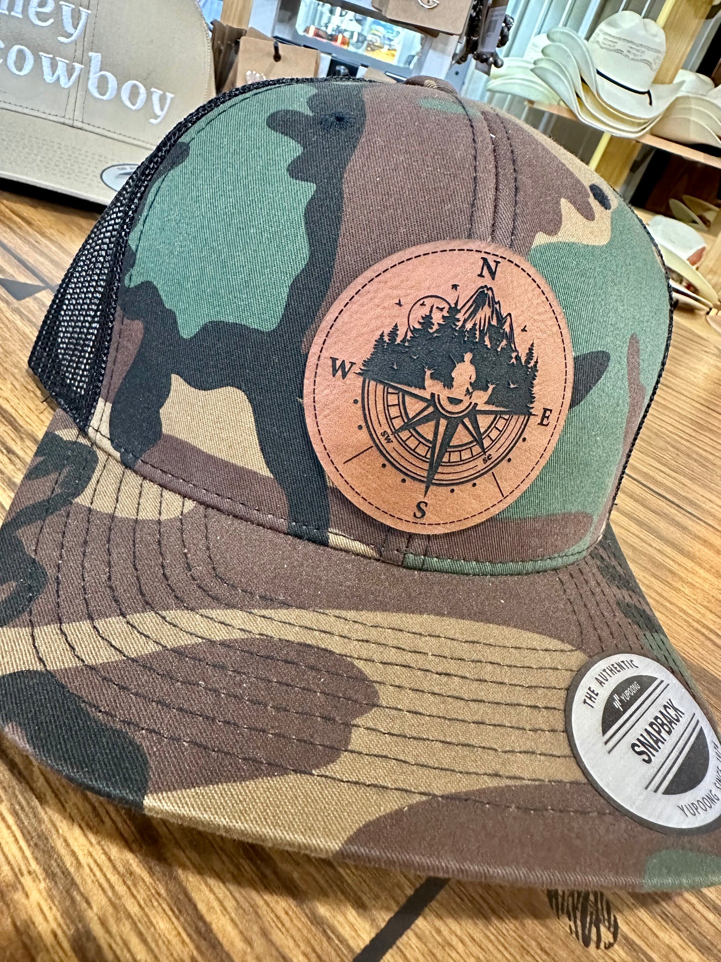 Compass Leather Patch Trucker Hat